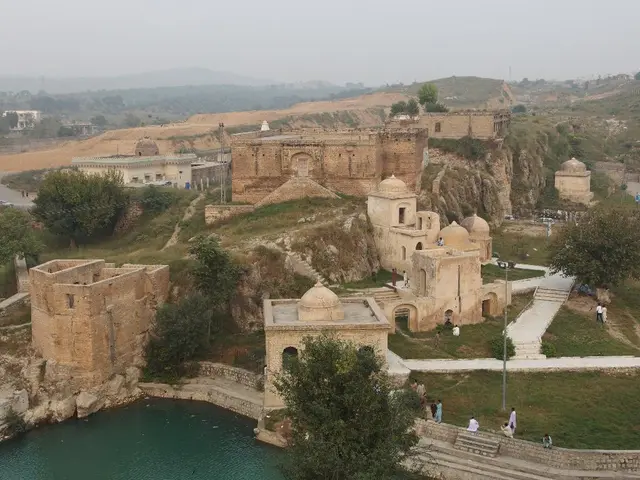 Historic manor with a thousand years of past intertwined, featuring a moat reminiscent of the...